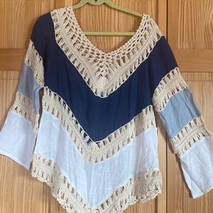 Navy & white w/crochet across neckline/parts of sleeves. measures 32”long/23”